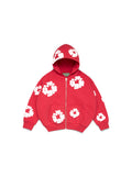 Red Denim Tears hoodie with white floral patterns on a white background
