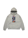 Gray Denim Tears hoodie with a colorful graphic on the chest against a white background
